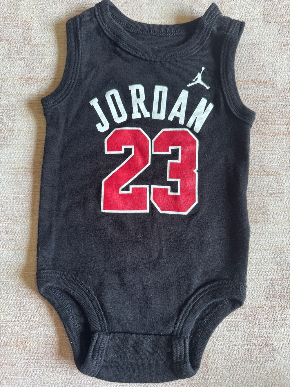 Jordan Black Infant Sleeveless Bodysuit with Red & White Accents